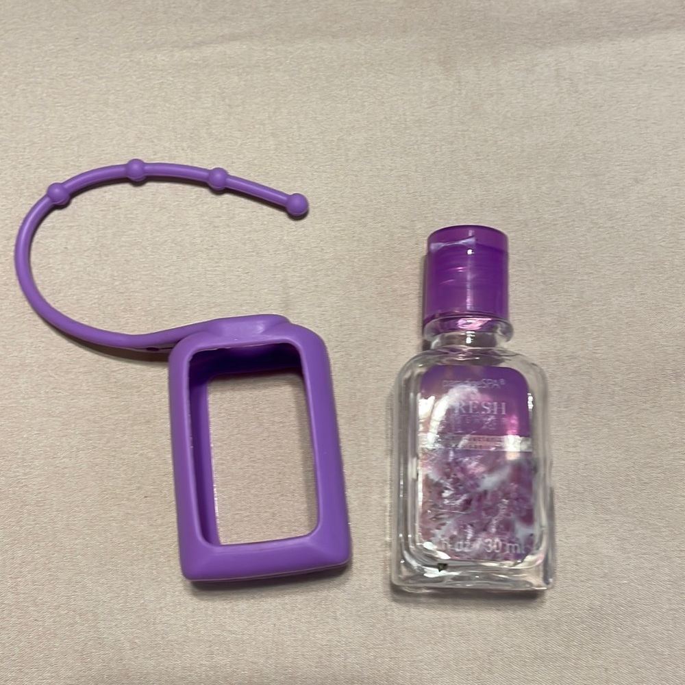 Purple hand sanatizer holder